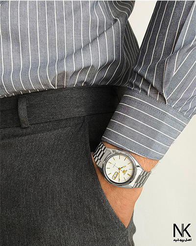 ساعت مردانه سیکو با بند استیل و صفحه گرد سفید رنگ همراه با تقویم، عقربه دار