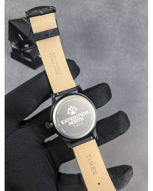 پشت ساعت تایمکس مردانه با صفحه گرد و  بند برزنت 